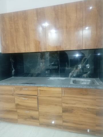 Kitchen in 3 BHK Apartment at Rajouri Garden – for Rent