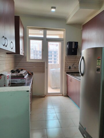 Kitchen in 3 BHK Apartment at Amrapali Silicon City, Sector 76 – for Rent
