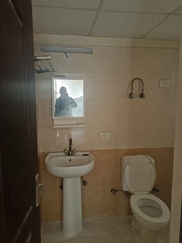 Bathroom in 3 BHK Apartment at Gardenia Golf City, Sector 75 – for Rent