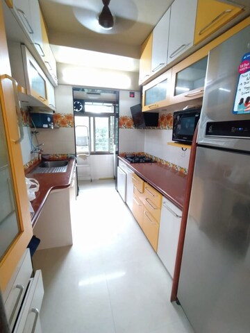Kitchen in 2 BHK Apartment at Bredco Viceroy Court, Kandivali East – for Sale