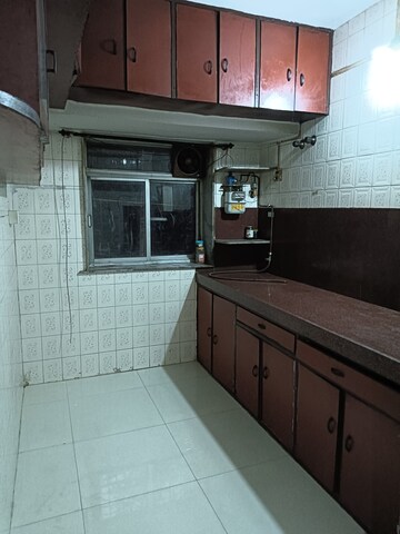 Kitchen in 1 BHK Apartment at Alaknanda CHS Nerul, Nerul Sector 19a – for Rent