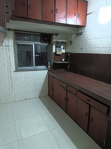 Kitchen in 1 BHK Apartment at Alaknanda CHS Nerul, Nerul Sector 19a – for Rent
