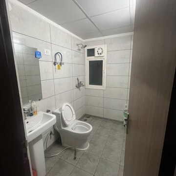 Bathroom in 3 BHK Apartment at Sikka Karnam Greens, Garhi Village – for Rent