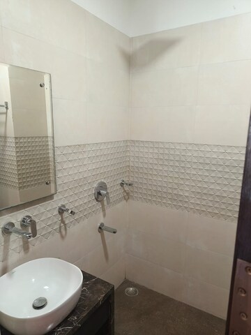 Bathroom in 3 BHK Builder Floor at Ansal Sushant Lok I, Sector 43 – for Rent