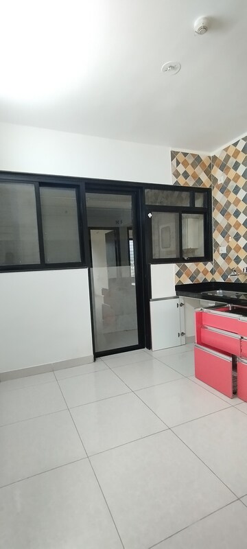 Kitchen in 2.5 BHK Apartment at Sargam CHS Nanded, Sinhagad Road – for Rent