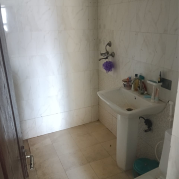Bathroom in 2.5 BHK Apartment at Gardenia Golf City, Noida Central – for Rent