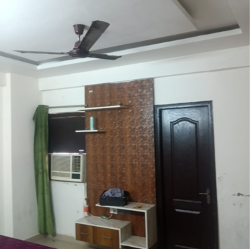 Living Room in 2.5 BHK Apartment at Gardenia Golf City, Noida Central – for Rent