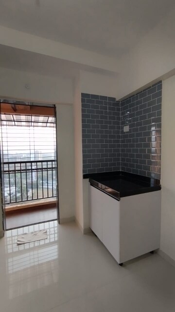 Room in 2 BHK Apartment at Raunak City Sector 4 D8, Kalyan West – for Rent