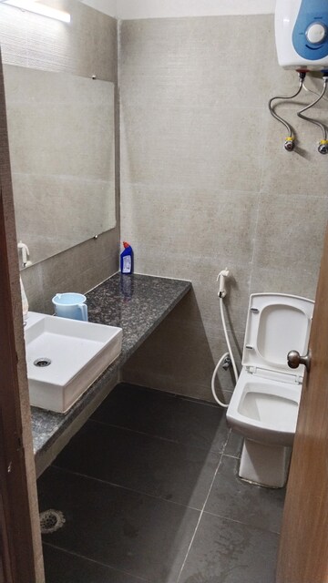 Bathroom in 1 BHK Apartment at Paramount Golfforeste, Zeta I Greater Noida – for Rent