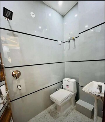 Bathroom in 2 BHK Apartment at Mango – for Sale