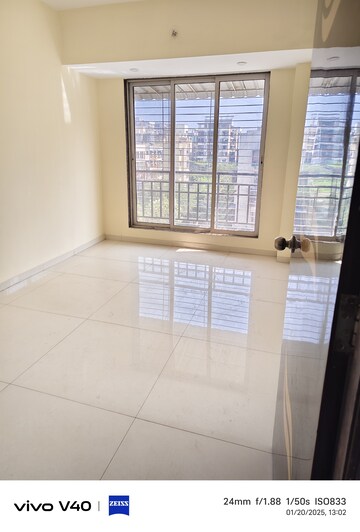Room in 2 BHK Apartment at Aaditya Rudra, Karanjade – for Sale