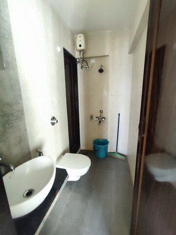 Bathroom in 1 BHK Apartment at Vihang Valley Phase 3, Kasarvadavali – for Rent