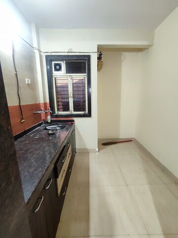 Kitchen in 1 BHK Apartment at Sanghvi Hills, Ghodbunder Road – for Rent