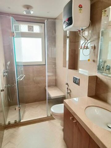 Bathroom in 3 BHK Builder Floor at Ansal Sushant Lok I, Sector 43 – for Rent