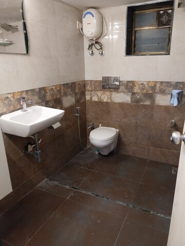 Bathroom in 1.5 BHK Apartment at Daulat Shirin CHS, Colaba – for Rent
