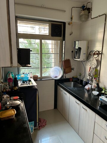 Kitchen in 4 BHK Apartment at Thakur Jewel Tower, Kandivali East – for Rent