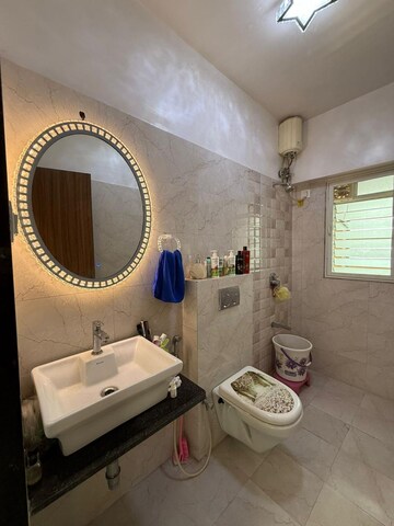Bathroom in 2 BHK Apartment at DLH Metroview, Andheri West – for Rent