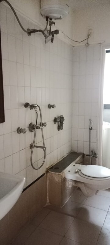 Bathroom in 2 BHK Apartment at NRI Complex Phase I, Seawoods Sector 58 – for Rent