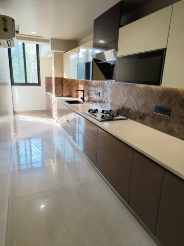 Kitchen in 4 BHK Builder Floor at Ansal Sushant Lok I, Sector 43 – for Sale