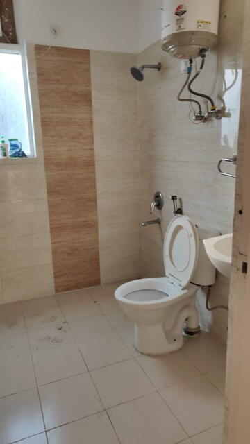 Bathroom in 3 BHK Apartment at Great Value Sharanam, Sector 107 – for Rent
