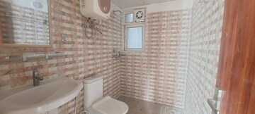 Bathroom in 3 BHK Apartment at Gardenia Golf City, Sector 75 – for Rent