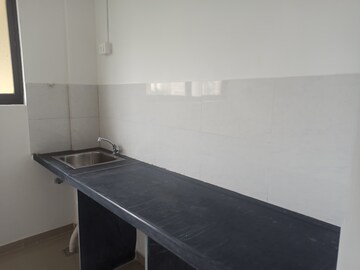 Kitchen in 1 BHK Apartment at Raymond Aashiyana, Vartak Nagar – for Rent