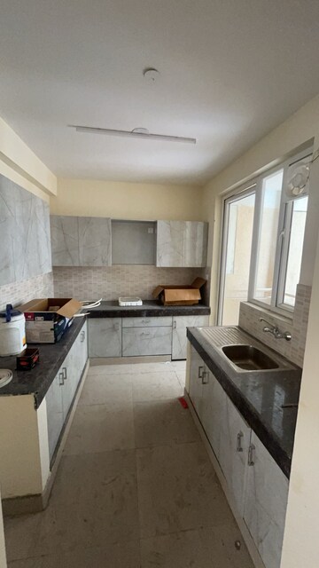 Kitchen in 3.5 BHK Apartment at Ansal Estella, Sector 103 – for Sale