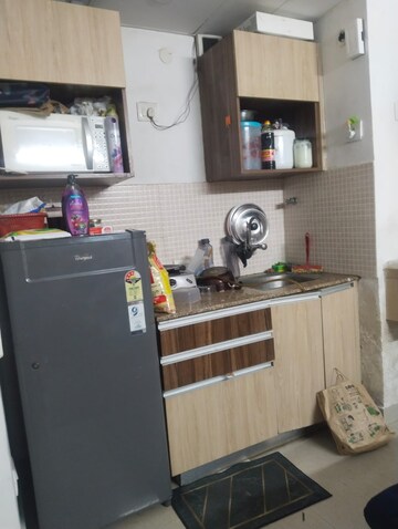 Kitchen in 1 RK Apartment at Supertech Ecociti, Sector 137 – for Rent