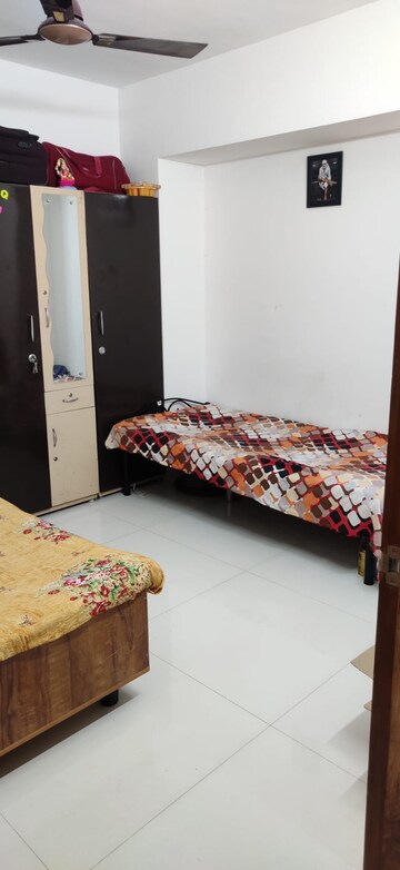 Bedroom in 2 BHK Apartment at KFP Chesterfield, Dhanori – for Rent