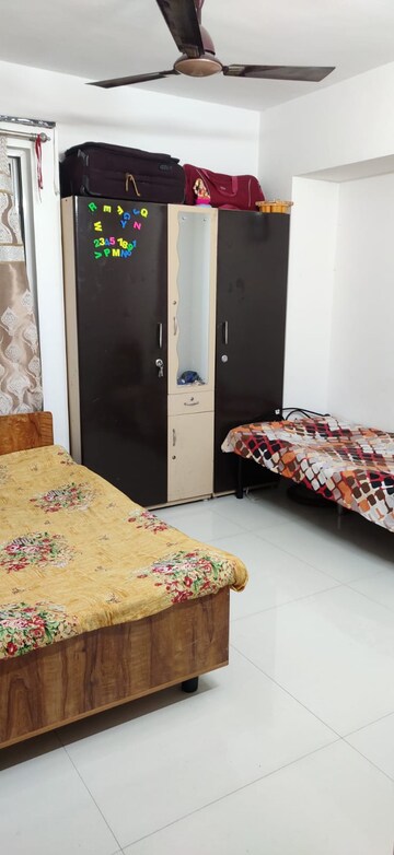 Bedroom in 2 BHK Apartment at KFP Chesterfield, Dhanori – for Rent