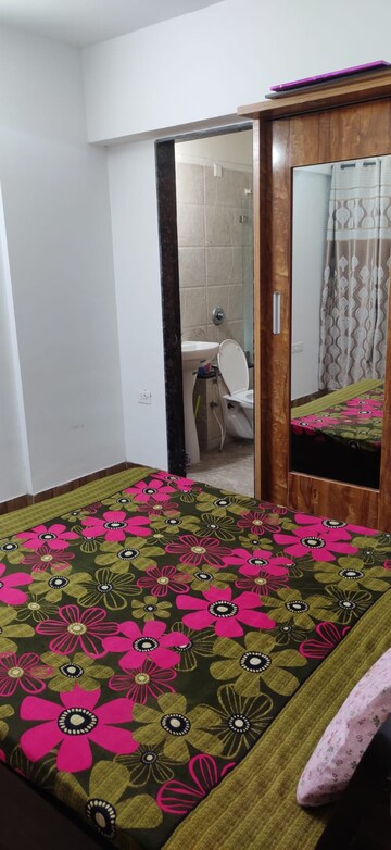 Bedroom in 2 BHK Apartment at KFP Chesterfield, Dhanori – for Rent