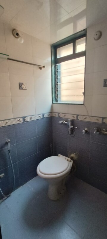 Bathroom in 2 BHK Apartment at Puranik Swapna Dhara, Ghodbunder Road – for Rent