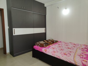 Bedroom in 2 BHK Apartment at Bhartiya Nikoo Homes, Thanisandra Main Road – for Rent