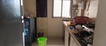 Kitchen in 1 BHK Apartment at Cosmos Angel, Owale – for Sale