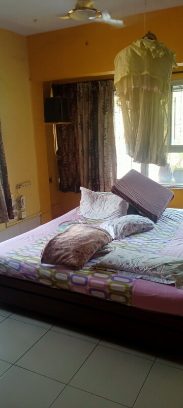 Bedroom in 4 BHK Apartment at Mahakali Model Town, Jogeshwari East – for Sale
