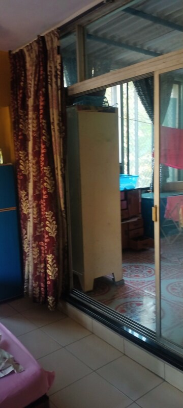 Bedroom in 4 BHK Apartment at Mahakali Model Town, Jogeshwari East – for Sale