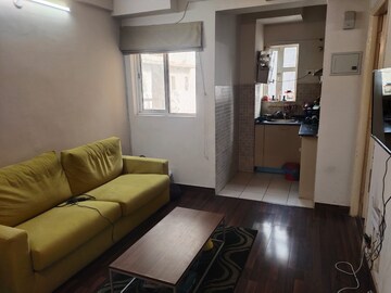 Living Room in Studio Apartment at Paras Tierea, Sector 137 – for Rent