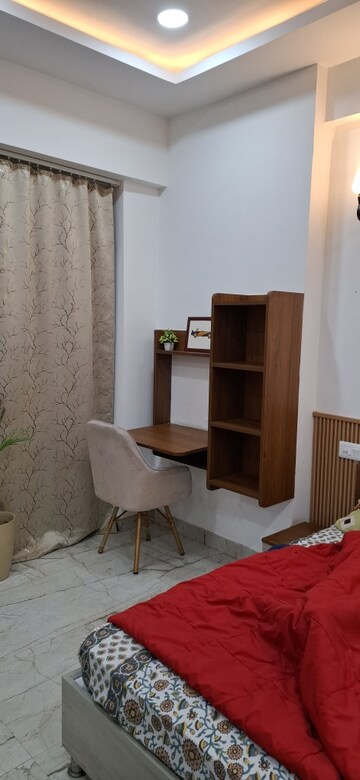 Living Room in Studio Apartment at Gaur City Center, Sector 4, Greater Noida – for Rent