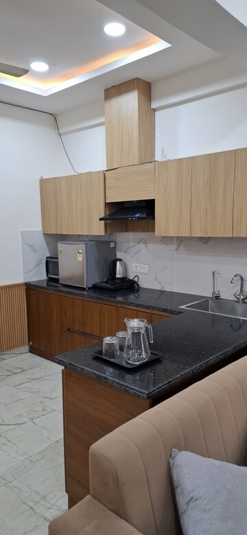 Kitchen in Studio Apartment at Gaur City Center, Sector 4, Greater Noida – for Rent