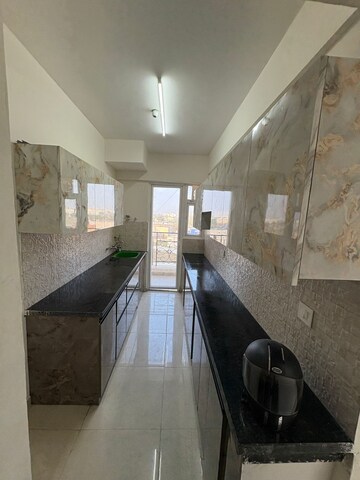 Kitchen in 2 BHK Apartment at Signature The Millennia 2, Sector 37d – for Rent
