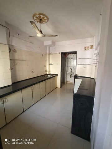 Kitchen in 2 BHK Apartment at RNA Broadway Avenue, Mira Road – for Rent