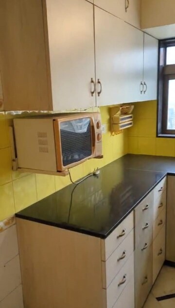 Kitchen in 3 BHK Apartment at Mahindra Lifespaces Belvedere Court, Mahalaxmi – for Rent