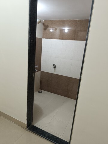 Bathroom in 2 BHK Apartment at Varun Garden, Ghodbunder Road – for Rent