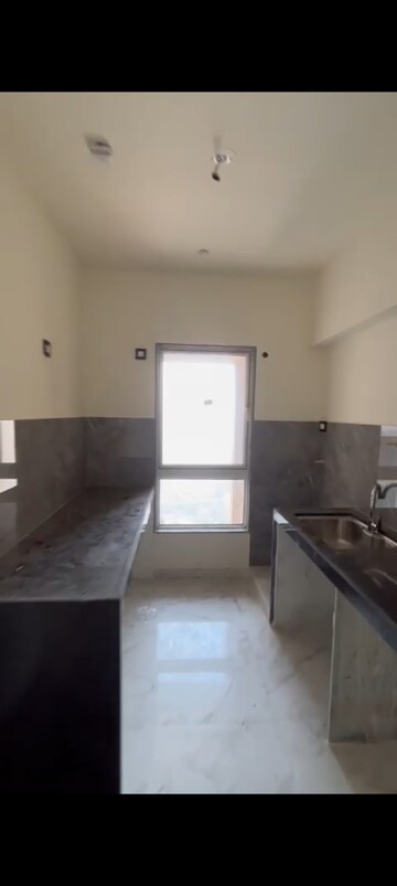 Kitchen in 2 BHK Apartment at Swagat Narendra Park CHS, Naya Nagar – for Rent