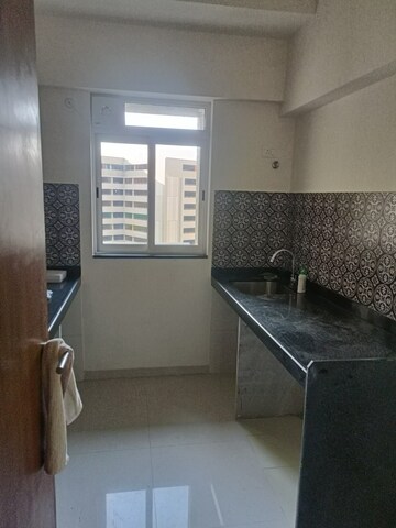 Living Room in 1 BHK Apartment at Lodha Amara, Kolshet Road – for Sale