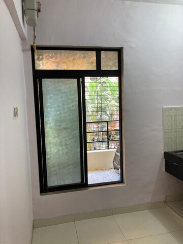 Room in 2 BHK Apartment at Seawoods – for Sale