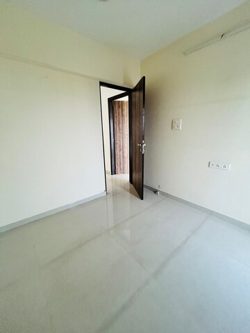 Room in 2 BHK Apartment at Seawoods – for Sale