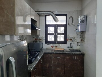 Kitchen in 2 BHK Builder Floor at Spire Wood, Sector 46 – for Rent