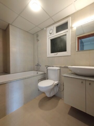 Bathroom in 3.5 BHK Apartment at Bhartiya City Nikoo Homes II, Thanisandra Main Road – for Rent