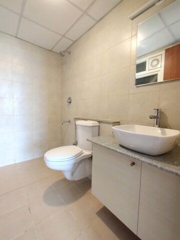 Bathroom in 3.5 BHK Apartment at Bhartiya City Nikoo Homes II, Thanisandra Main Road – for Rent